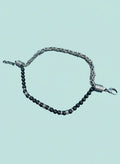 Bracciale "Dual Contrast" – Mix di catena bizantina e pietre onice nera con dettagli incisi